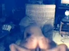 In cowgirl posture, an incredible long-haired, sexy girl mounts a huge dick.